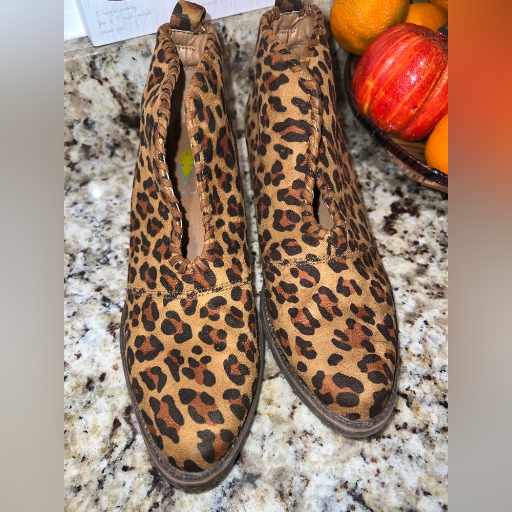 Like new SIZE 7 VOLATILE leopard print booties with slit down front.